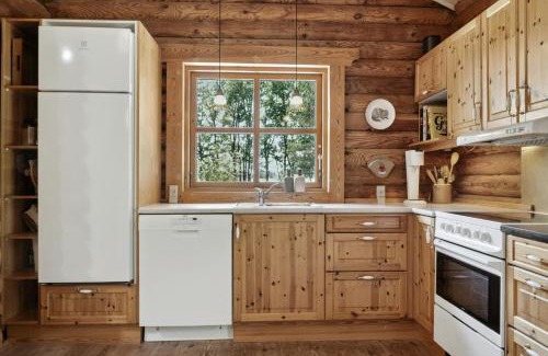 Øster Melholt Casa | Nordic Log Cabin With Views Over The Fields