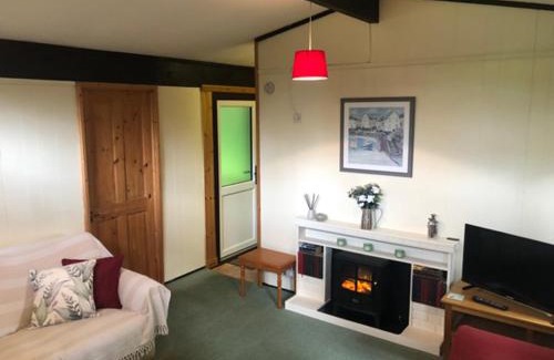 Cenarth Casa | Nuthatch Lodge is set in 24 acres of wood, parkland near the village of Cenarth