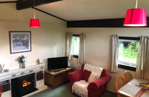 Cenarth Casa | Nuthatch Lodge is set in 24 acres of wood, parkland near the village of Cenarth