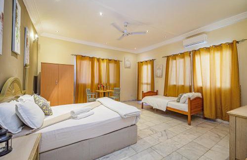 Brusubi Hotel | Ocean Villa Heights