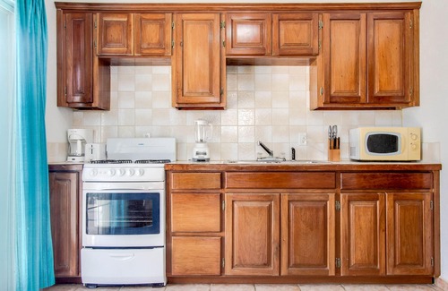 Boca Ciega Casa | Villa frente al mar con piscina compartida, acceso a la playa, excelentes vistas.