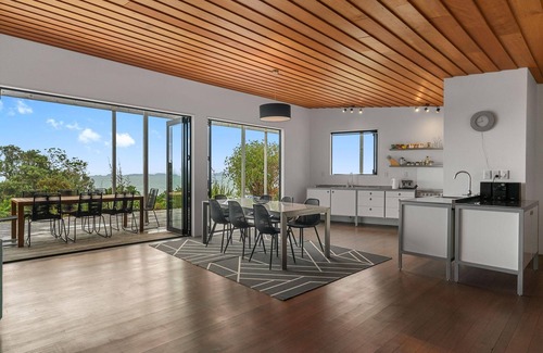 Langs Beach Casa | Oceanview Sanctuary - Modern, sunny holiday home with extensive decks and stunning views over Bream Bay