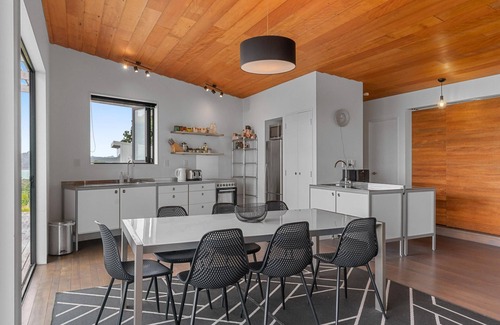 Langs Beach Casa | Oceanview Sanctuary - Modern, sunny holiday home with extensive decks and stunning views over Bream Bay