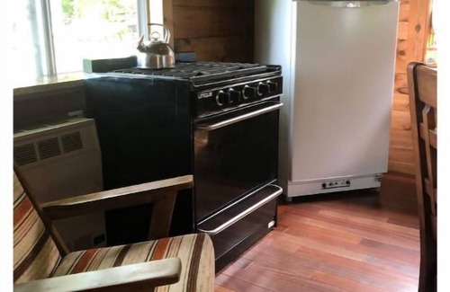 Orland Cabina | Off Grid Mountain Cabin w/skyline & kayaks