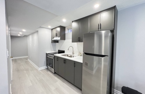 Meadowvale Village Casa | One bedroom ensuite toilet on main level & kitchen, living, bathroom lower level