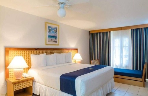 Palm Beach Hotel | One Bedroom Suite @ Caribbean Palm Village Resort