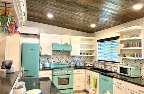 Titusville Casa | Orlando Vacation Rental Heated Pool & Spa 5 BR 3 BA Near Space, Nature, Disney