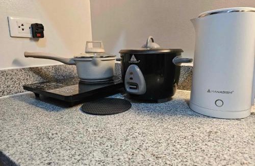 Bantud Hacienda Apartamento | Otsukare 703 at Mesavirre Garden Residences