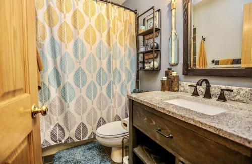 Aberdeen Casa | OurCozyOasis, Relax in the warmth of the fireplace in this homey upstairs.