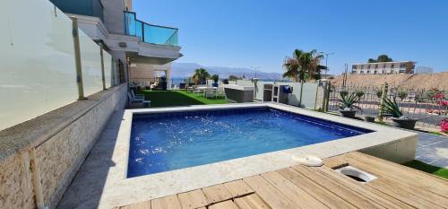 Eilat Apartamento | Palmore Resort 4 bedroom apartment with Private Pool - By Amdar Holiday Apartments
