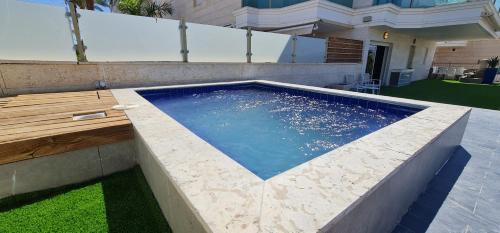 Eilat Apartamento | Palmore Resort 4 bedroom apartment with Private Pool - By Amdar Holiday Apartments