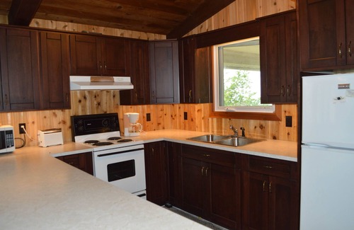 Bluewater Cabaña | Peach of a private beach! Waterfront cliff cottage near Bayfield