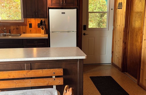 Bluewater Cabaña | Peach of a private beach! Waterfront cliff cottage near Bayfield