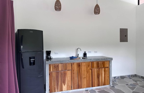 Javilla Apartamento | Private Studio, 90 seconds to the beach, with AC, WiFi, & Pool