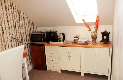 Maple Creek Casa | Private top floor of house.