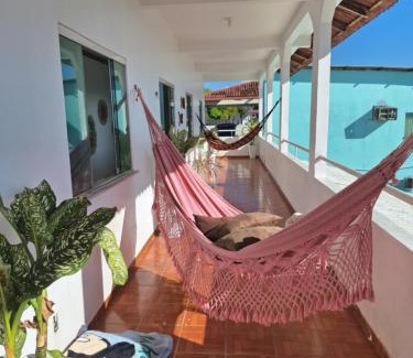 Alvorada Casa | Quarto triplo com banheiro compartilhado