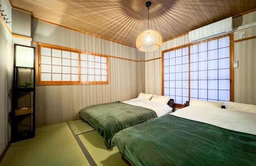 Shin-Osaka Villa | R 新大阪 FUJI サウナ付きの５LDK 3つのお風呂でグループで楽しめます。