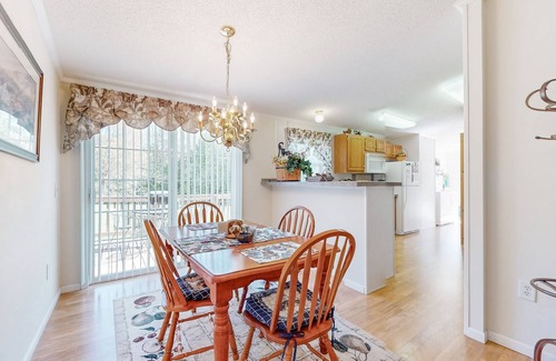 Sparta Casa | Riverfront home with a large yard, fireplace, deck, & washer/dryer