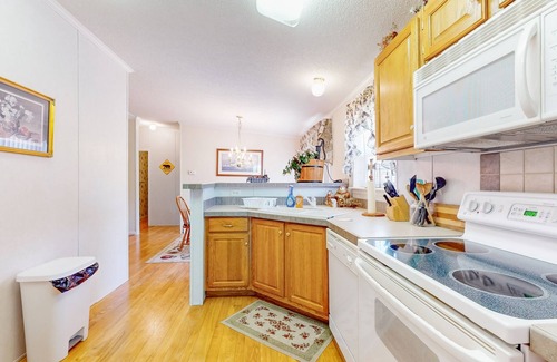 Sparta Casa | Riverfront home with a large yard, fireplace, deck, & washer/dryer