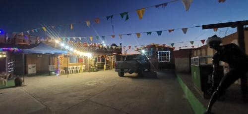 Rosarito Casa | Salón y habitaciones