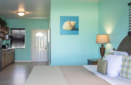 Rolleville Hotel | Sand Dollar Unit: Sandy Isle Escapes -formally Shoreline Beach Club