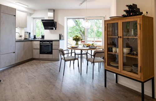 Schrozberg Apartamento | Schmalfelden No. 95 with spa oasis in the living room: compact sauna, loungers and fireplace. Fenced garden with great veranda!