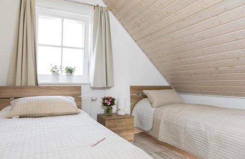 Greetsiel Apartamento | Schwalbennest Greetsiel für bis zu 6 Personen mit Kaminofen, Whirlpool und Sauna - Haustiere herzlich willkommen, nah am Hafen