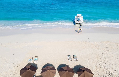 Grace Bay Apartamento | SEASCAPE HOTEL SUITES in superb Grace Bay with Pool, Beach Access, Full kitchen