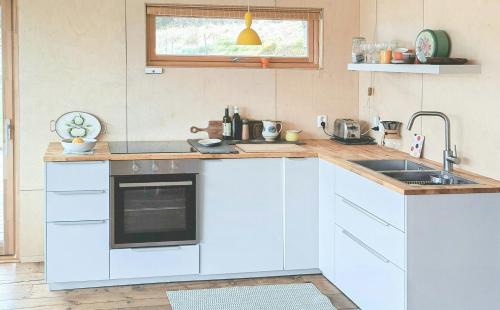 Hyllestad Casa | Self-Built Cabin With Views Over Leirvik