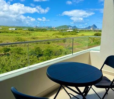 Candos Apartamento | Serenity Sunset View Apartment Hotel - Verdant Garden