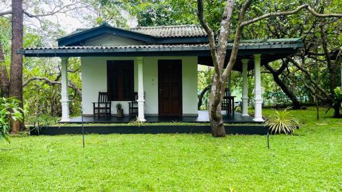 Dambulla Hotel | Sigiri Suncap Cottage