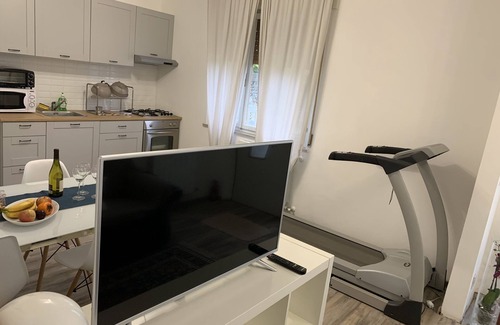 Udine Casa | Pequeña casa con jardín en pueblo histórico.