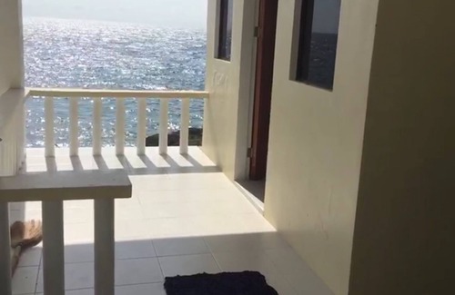 Catmon Casa | Pequeñas casas en una playa privada