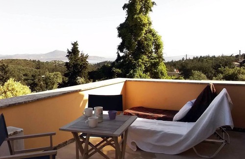 Douliana Casa | Small village house, shared pool and views of the countryside and sea