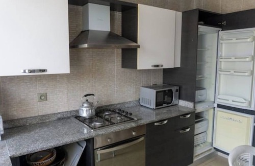 Cite Al Mohammadi Apartamento | Spacious apartment: Comfort, Parking and Wi-Fi.