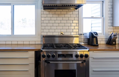 Quad Cities Casa | Spacious family home with luxe beds, fenced in back yard, heart of town!