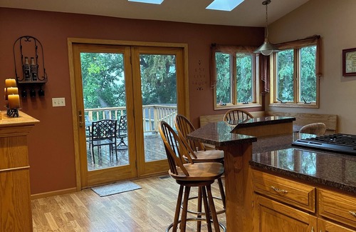 Ortonville Casa | Spacious home with a large deck and ample space for beautiful sunset viewing!