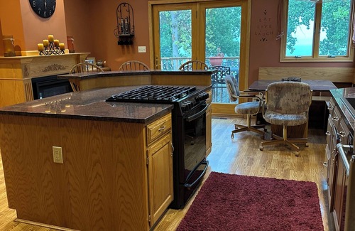 Ortonville Casa | Spacious home with a large deck and ample space for beautiful sunset viewing!