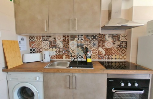 Faro Apartamento | Apartamento reformado en Faro, con internet