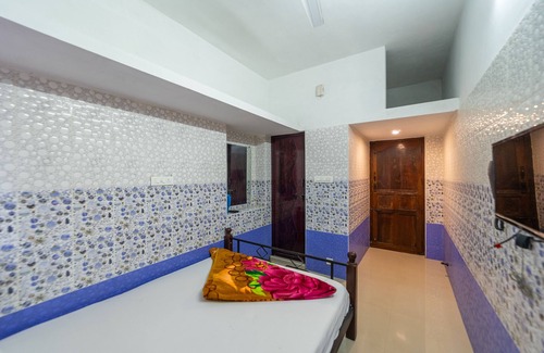 Valparai Hotel | Sri Nandha Luxury Comforts