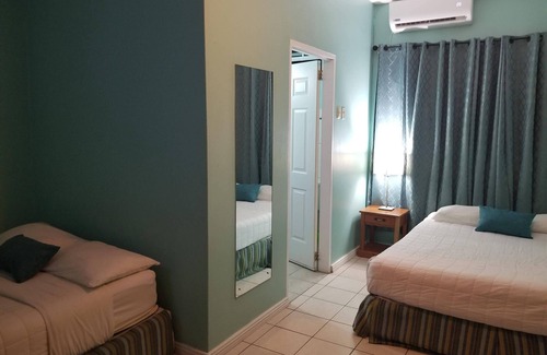 Buccoo Hotel | Habitación estándar con dos camas.