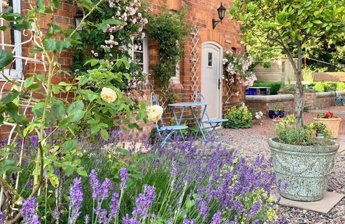 Halfway House Cabaña | Stay in a Regency Coachouse retreat set in a rural Shropshire village.