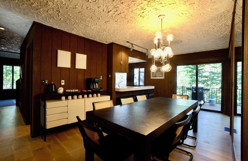 Michaywe Casa | Step into Time Capsule Tower, a retro 70s escape with 5 themed bedrooms, movie room, hot tub, sauna, arcade & more. Centrally located near Northern Michigan golf, lakes, skiing, & off-road and snowmobile trails with access to a community pool.