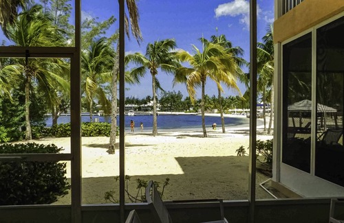Rum Point Condominio | Stunning beachfront condo. Relax, Enjoy, Sunset, RumPoint, Pool & Heated Jacuzzi