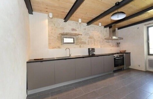 Garrigues-Sainte-Eulalie Casa | Casa de carácter + jardín y pisc, renovación contemporánea