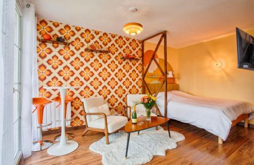 Quartier du vieux cimetiere Apartamento | Suite année 70 - Jacuzzi et Balcon