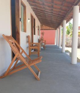 Ponta do Anel Apartamento | Suite Lua - Quarto e Banheiro com Ar Condicionado no Macapa Paradise