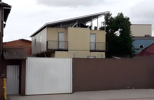 Ressacada Apartamento | Suite TEN air conditioning and kitchen