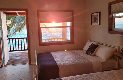 Salt Pond Cabina | Sunset Beach Room - Long Island Harbour Club