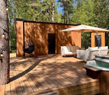 Laane-Nigula Parish Casa | Telise TinyOne is a modern forest cabin with a cozy hot tub